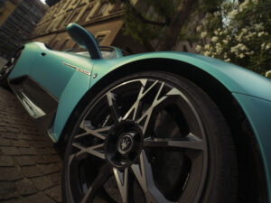 Close-up of Maserati MC20 Cielo Coupe alloy wheels with the iconic trident logo and high-performance brake calipers.