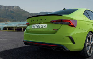 Rear view of Skoda Octavia RS 2025 highlighting taillights, RS badge, and sporty bumper design